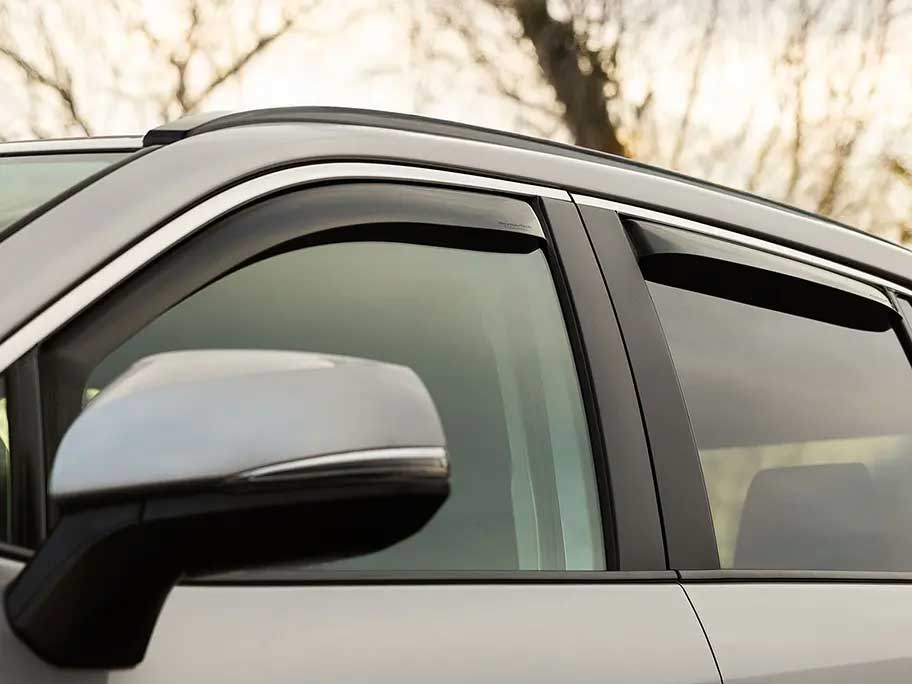 driver's side front and back car windows with deflectors